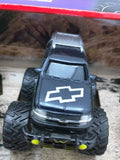 1/64 GM MUSCLE MACHINES MOTORIZED PETERSEN'S 4 WHEEL OFF ROAD TRUCK Silverado TrailBlazer