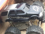 1/64 GM MUSCLE MACHINES MOTORIZED PETERSEN'S 4 WHEEL OFF ROAD TRUCK Silverado TrailBlazer